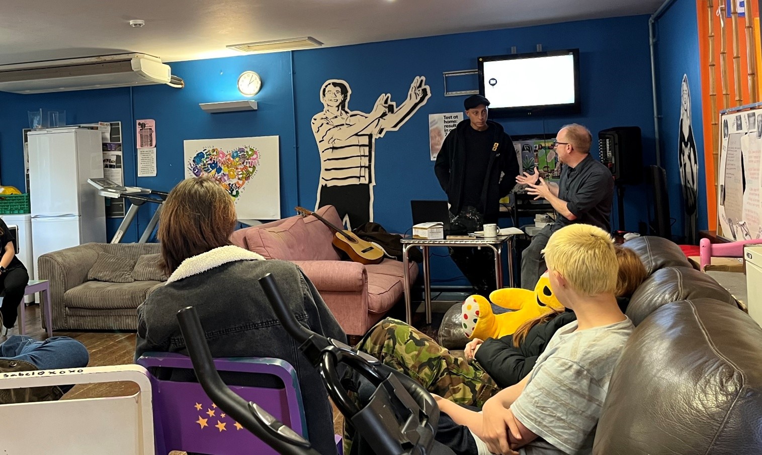 Young people participating in a workshop